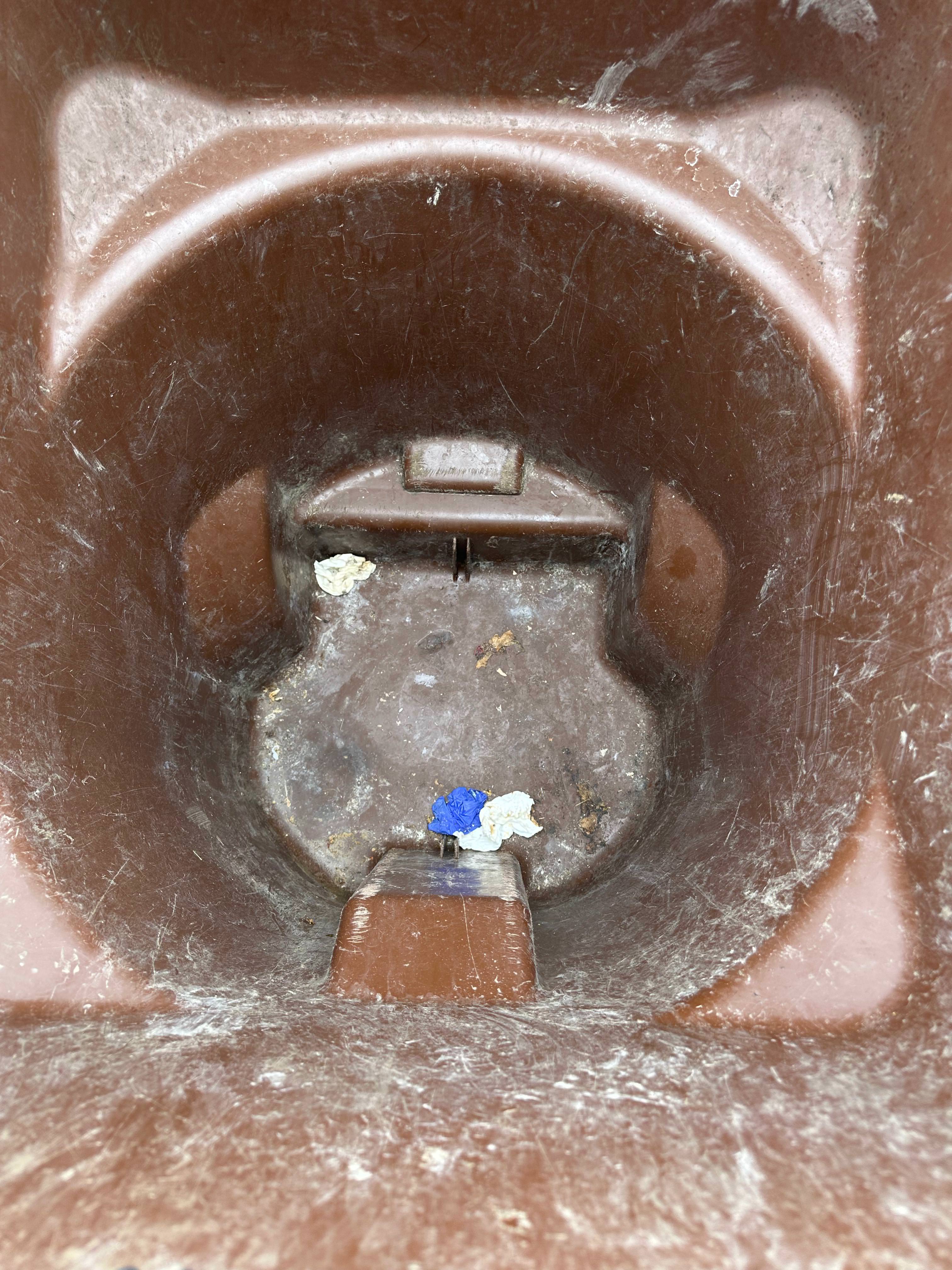 Dirty trash bin before cleaning Pflugerville TX